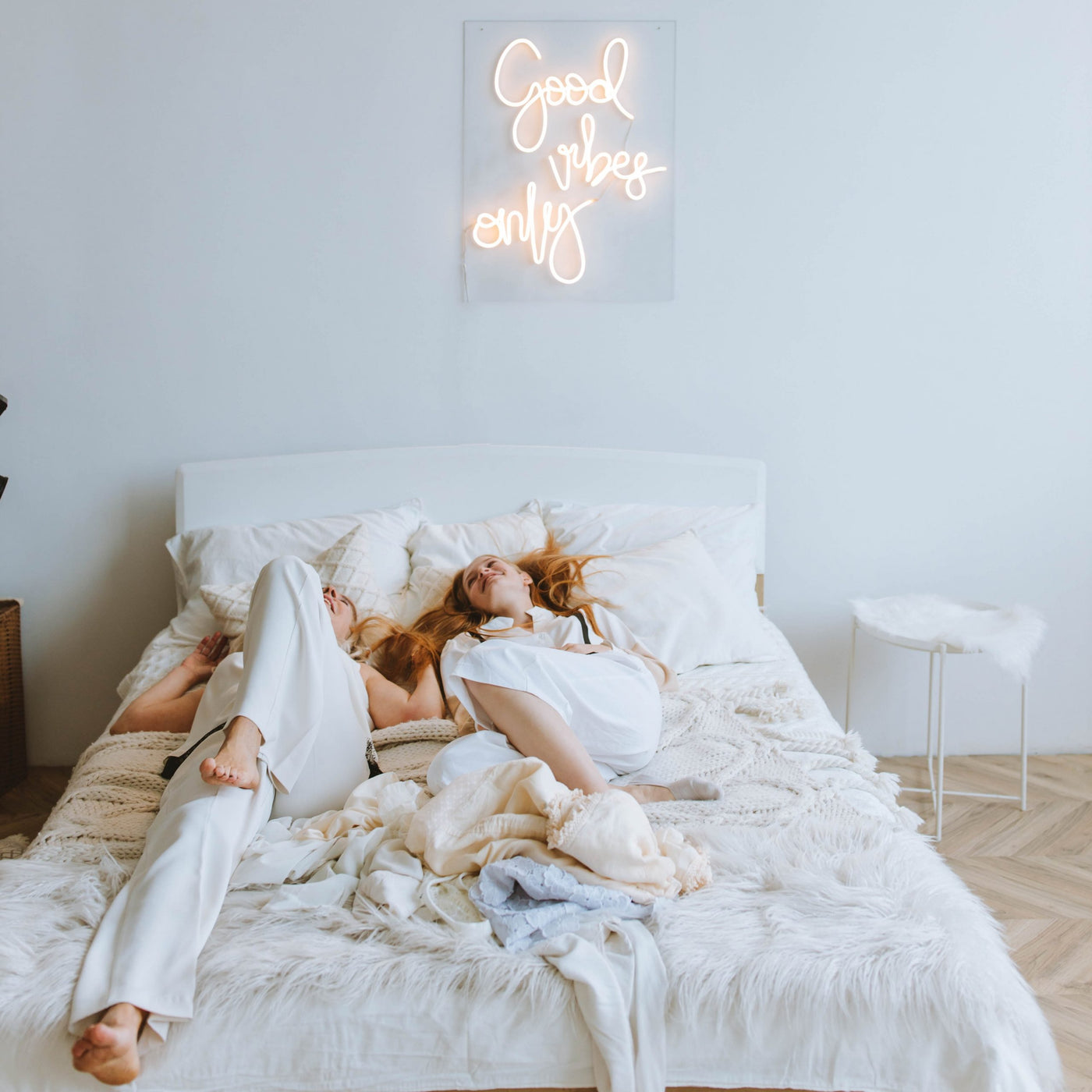 white neon aesthetic sign in bedroom